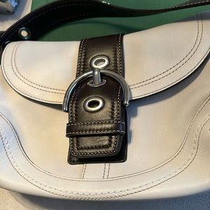 Brown and white Coach bag